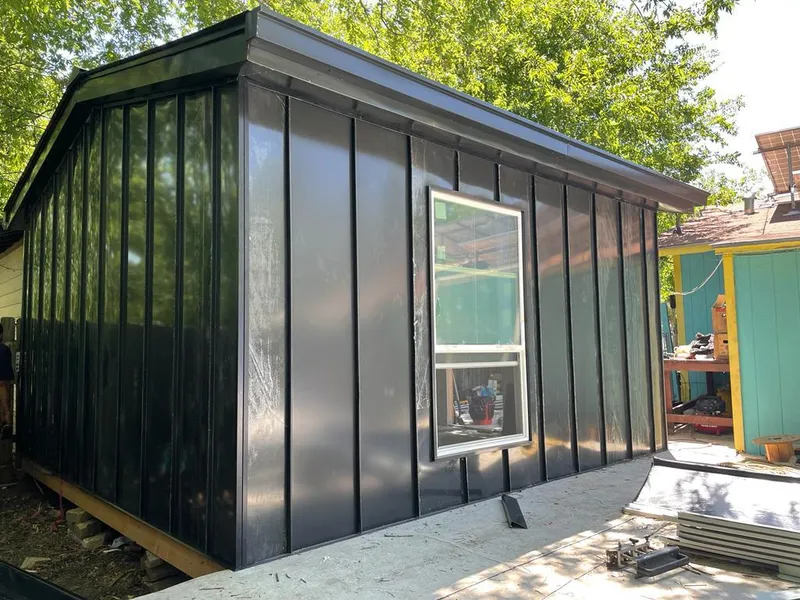 Black standing seam metal wall panels for Roof Inspection in Guilford