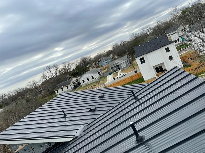 Standing seam metal roof panels with vents for Skylight Repair in Guilford
